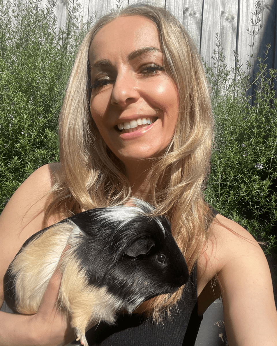 Aida Rejzovic holding Charlie, one of her rescued animals