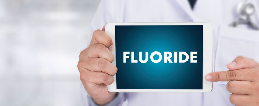 What are the effects of using a fluoride containing toothpaste long term? 